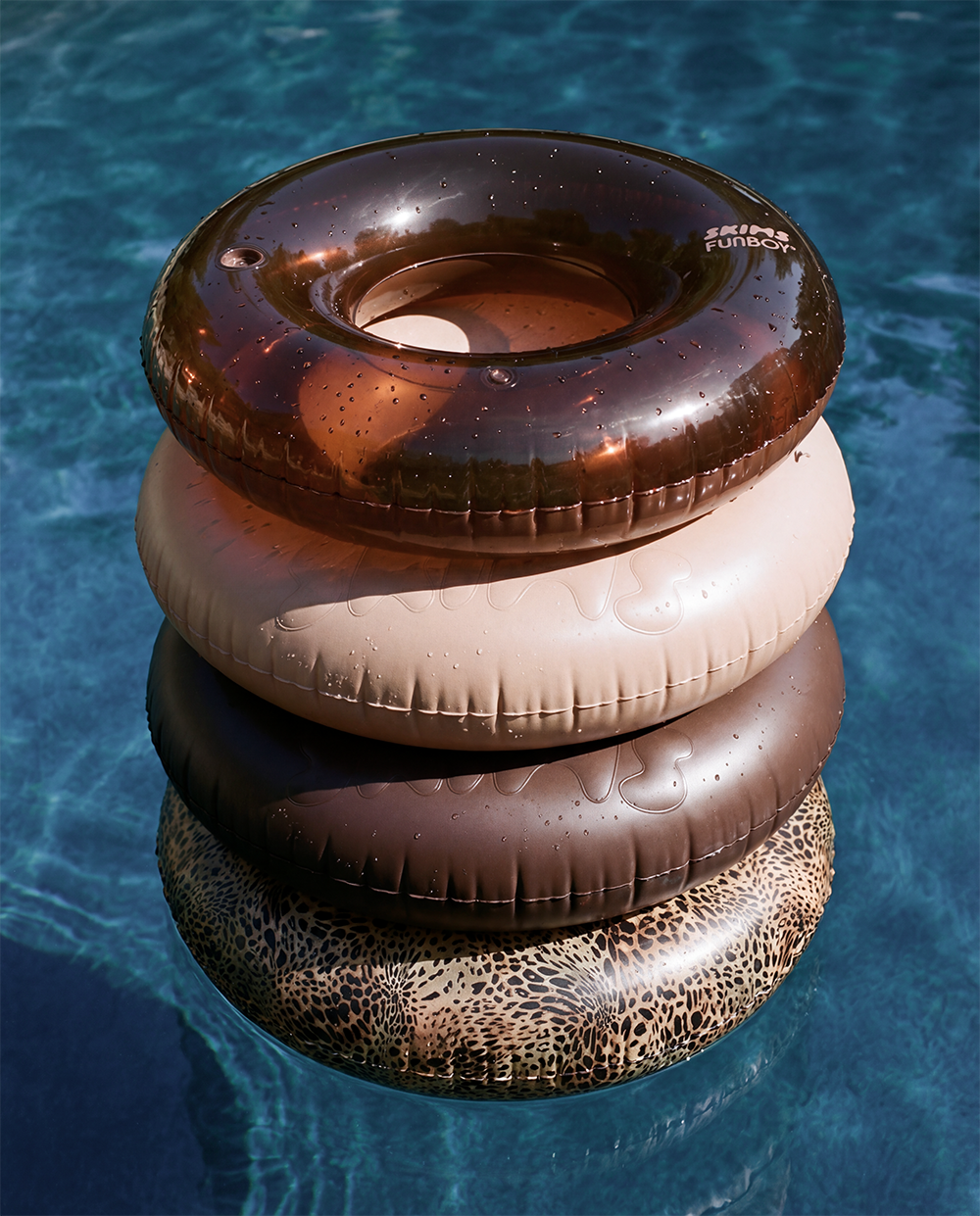 Funboy Popular | SKIMS x FUNBOY Cocoa Clear Tube Float, 46" Inflated w/ Cup Holder